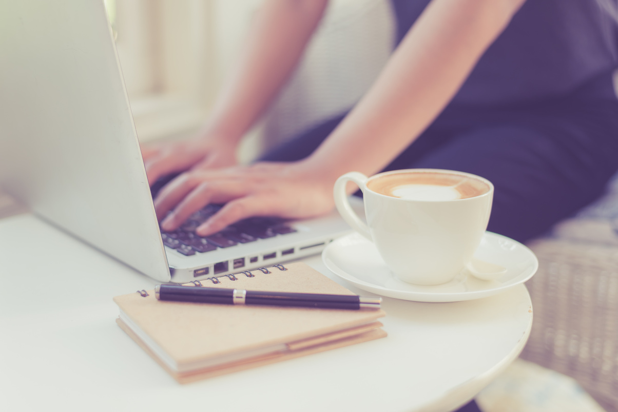 beautiful young woman using laptop computer